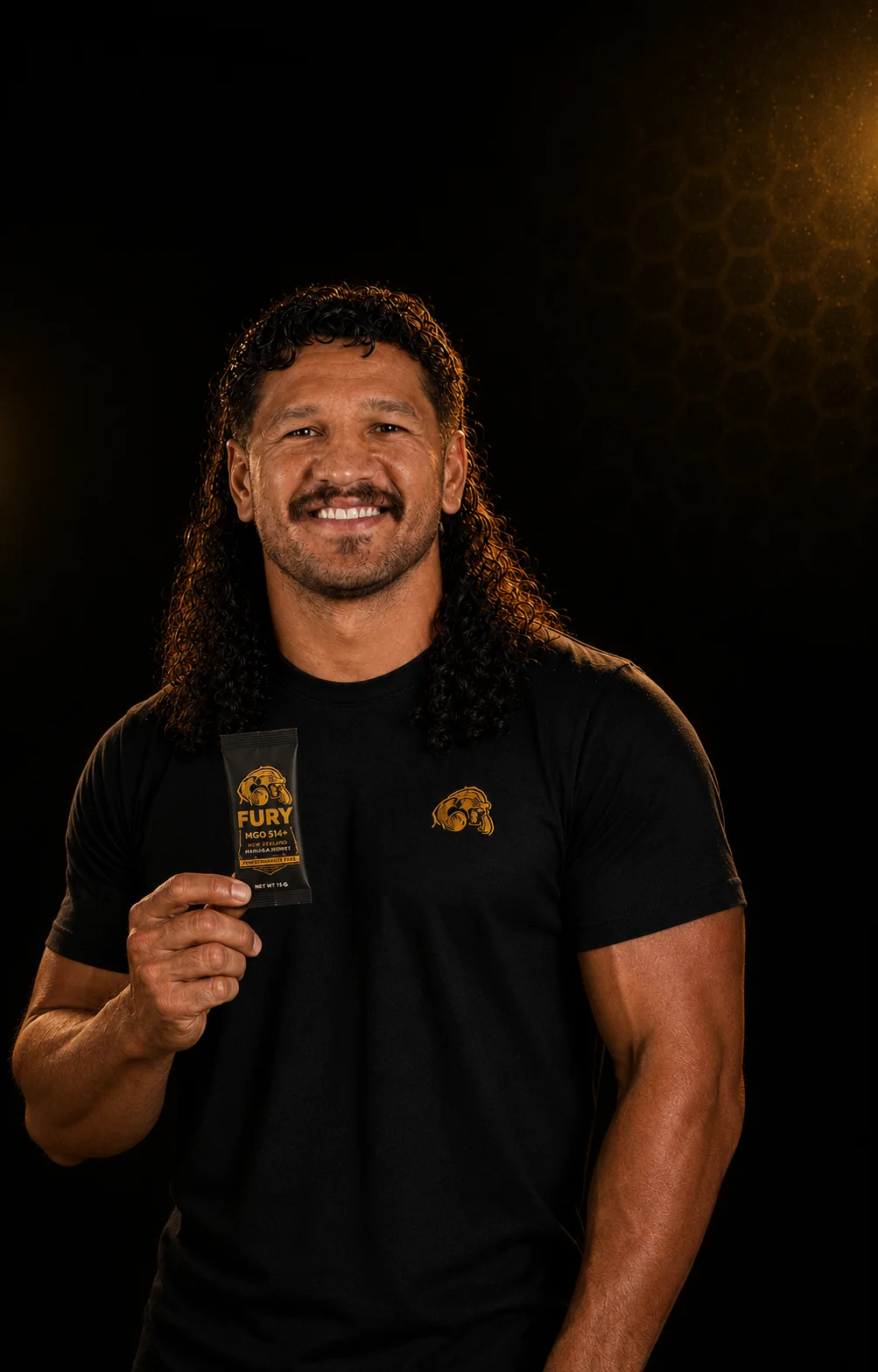 Dallin Watene-Zelezniak holding a FURY MGO 514+ Mānuka honey sachet
